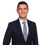 Smiling professional man in suit and tie