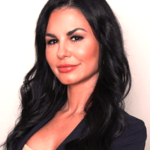 Professional brunette woman headshot in blazer